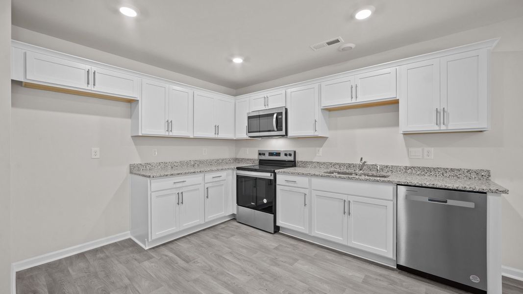 Furnished interior view inside a new home in Jetstream Park, Wilson (Image 4).