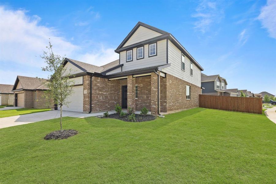 Front exterior of a new home in Burgess Meadows, Cleburne, TX, highlighting curb appeal (Image 1). Front exterior of a new home in Burgess Meadows, Cleburne, TX, highlighting curb appeal (Image 1).