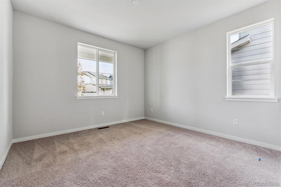 Spacious, unfurnished interior of a new home in Floret Collection at Parkdale Commons, Lafayette (Image 15).
