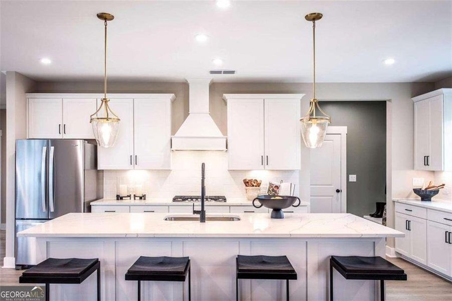 Furnished interior view inside a new home in The Paddocks at Doc Hughes, Buford (Image 7).