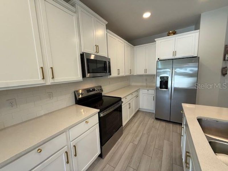 Furnished interior view inside a new home in , Winter Garden (Image 14).