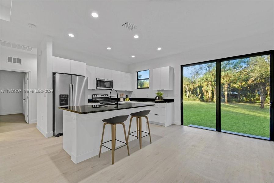 Furnished interior view inside a new home in , Lehigh Acres (Image 4). Furnished interior view inside a new home in , Lehigh Acres (Image 4).
