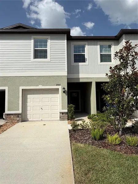 Front exterior of a new home in , San Antonio, FL, highlighting curb appeal (Image 1). Front exterior of a new home in , San Antonio, FL, highlighting curb appeal (Image 1).