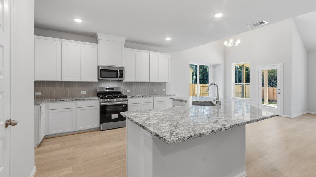 Furnished interior view inside a new home in The Woodlands Hills, Willis (Image 9).