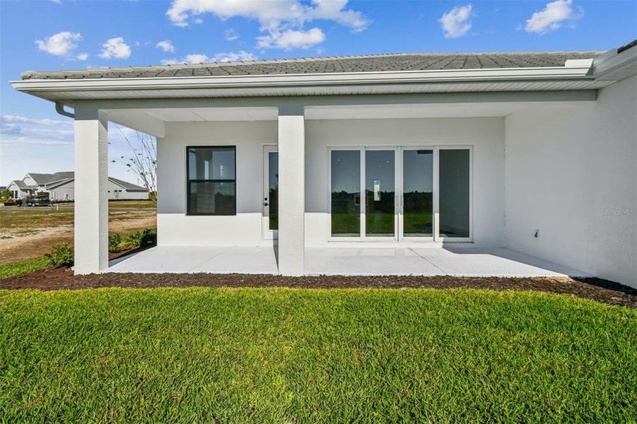Exterior details and patio area of a home in Palmera Wellen Park - Classic Series, Venice (Image 20). Exterior details and patio area of a home in Palmera Wellen Park - Classic Series, Venice (Image 20).
