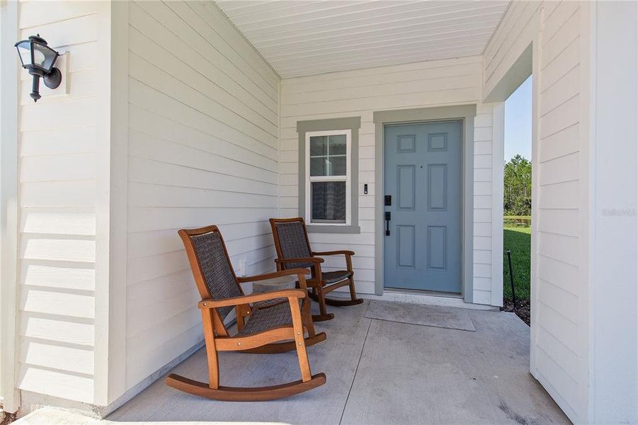 Exterior details and patio area of a home in Magnolia Series at Seminole Palms, Palm Coast (Image 3).
