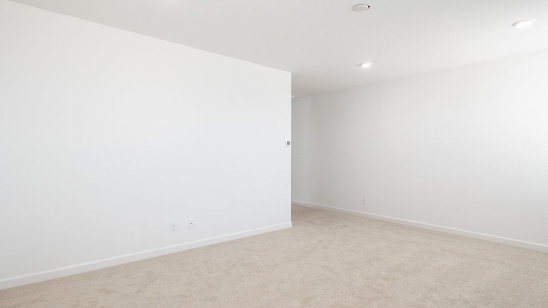 Spacious, unfurnished interior of a new home in Zanjero Pass, Waddell (Image 20).