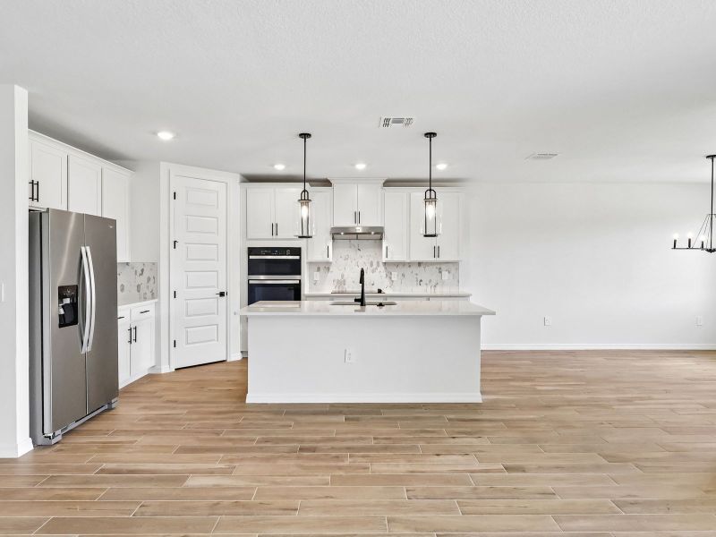 Furnished interior view inside a new home in The Grove at Stuart Crossing - Signature Series, Bartow (Image 4). Furnished interior view inside a new home in The Grove at Stuart Crossing - Signature Series, Bartow (Image 4).