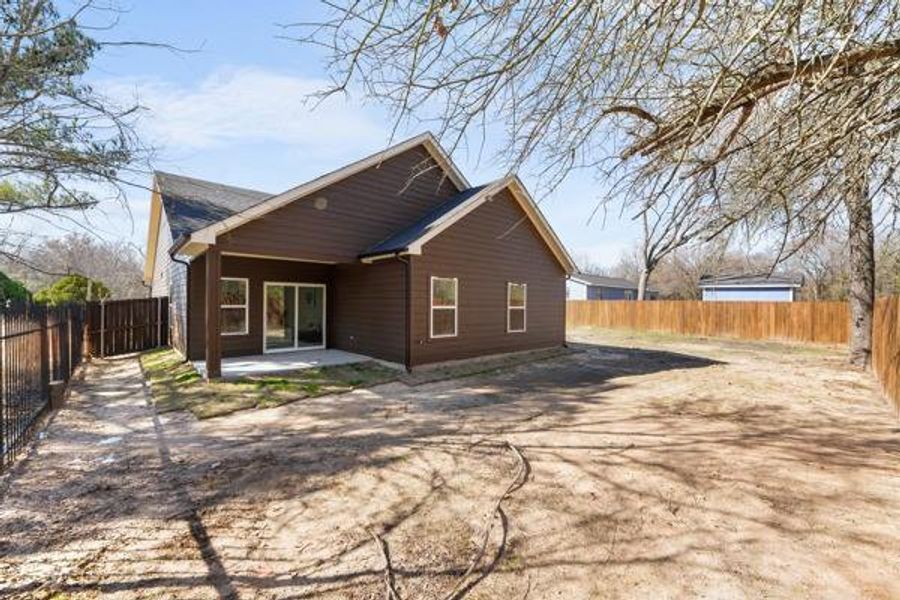 Exterior details and patio area of a home in , Tool (Image 4). Exterior details and patio area of a home in , Tool (Image 4).