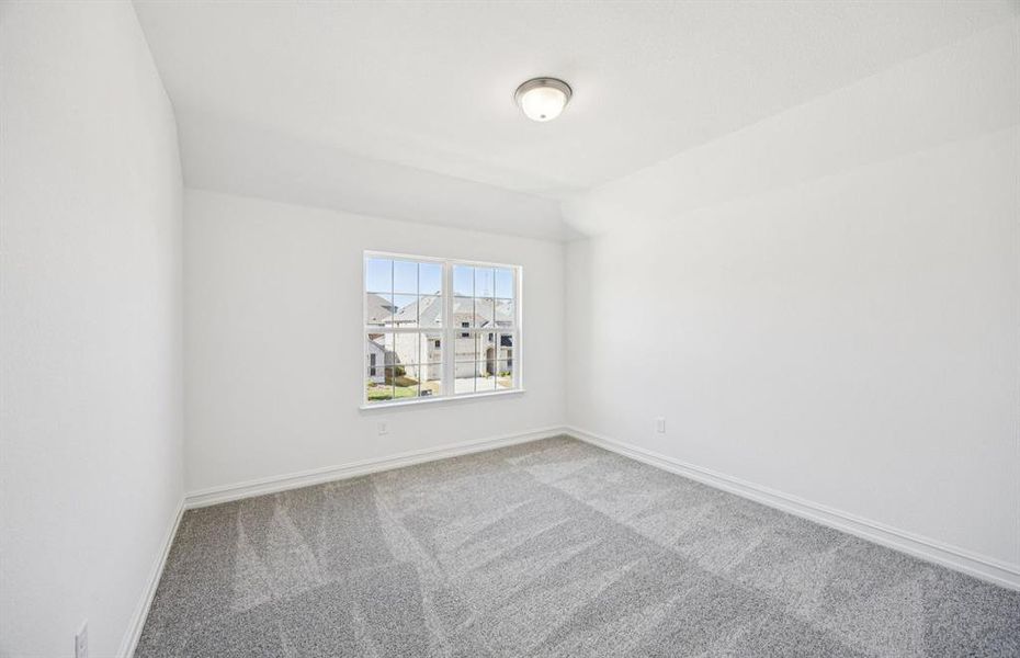 Comfortable bedroom with a bright window view Comfortable bedroom with a bright window view