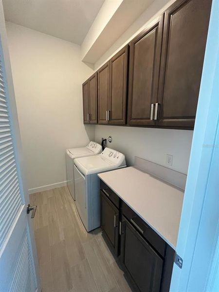 Furnished interior view inside a new home in Tesoro Club, Port St. Lucie (Image 6).