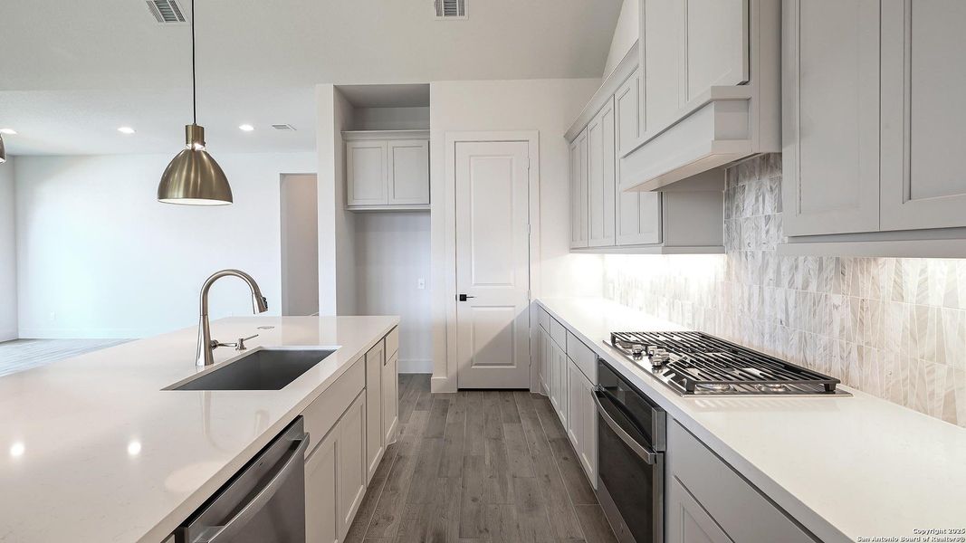 Furnished interior view inside a new home in Cibolo Valley Heights 65', Cibolo (Image 8).