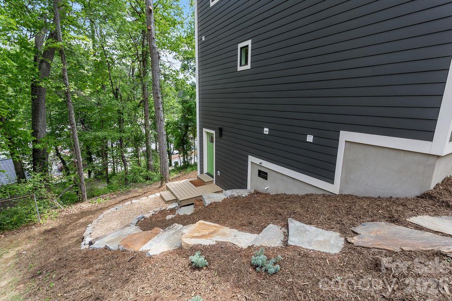 Exterior details and patio area of a home in , Asheville (Image 27).