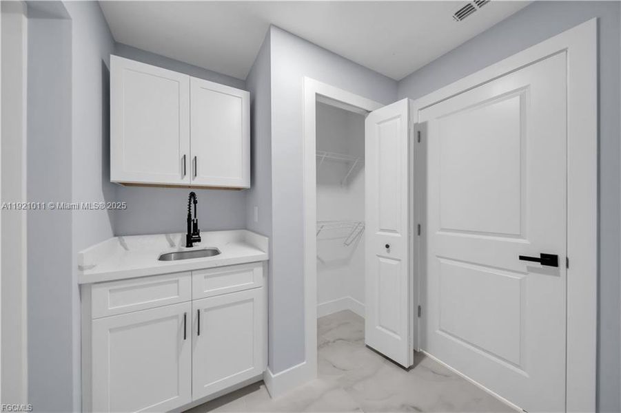 Furnished interior view inside a new home in , Lehigh Acres (Image 18).