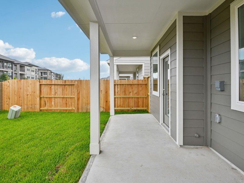 Exterior details and patio area of a home in Parkway Commons - City Series, Missouri City (Image 24). Exterior details and patio area of a home in Parkway Commons - City Series, Missouri City (Image 24).
