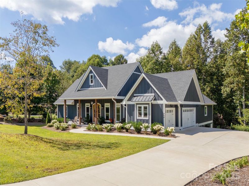 Front exterior of a new home in , Hendersonville, NC, highlighting curb appeal (Image 22).