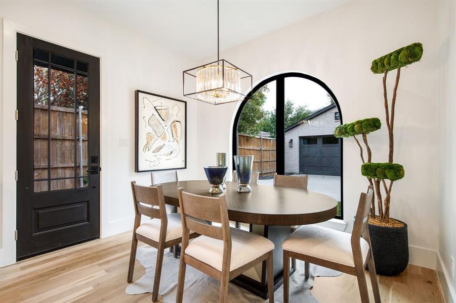 Light wood-finish flooring complements the white wall finish Light wood-finish flooring complements the white wall finish