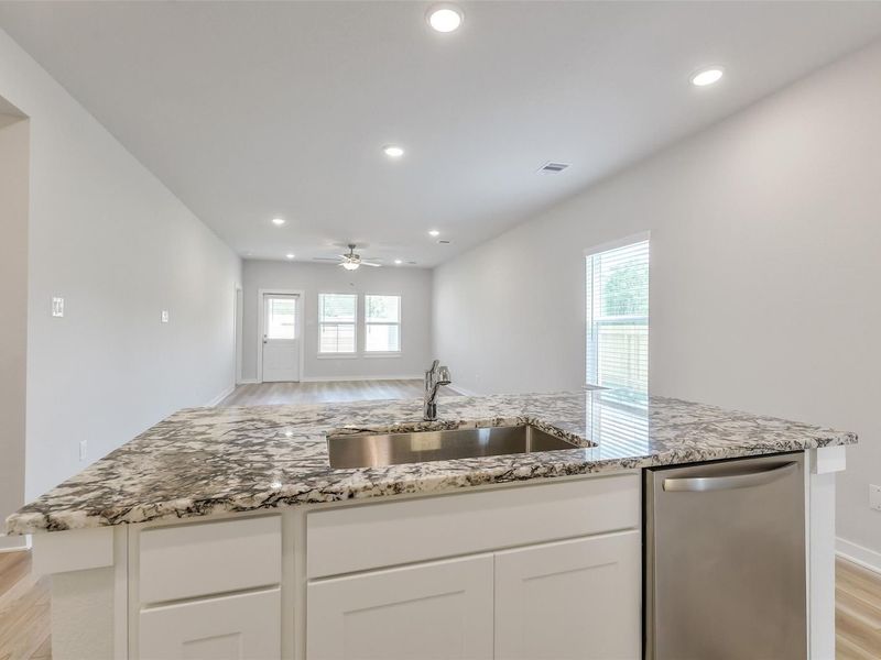 Furnished interior view inside a new home in Caney Creek Place, Conroe (Image 11).