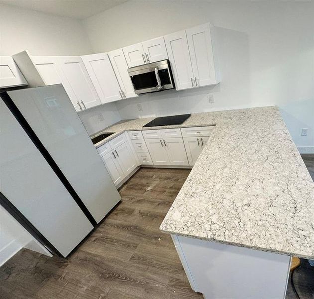 Furnished interior view inside a new home in , Winter Garden (Image 6).