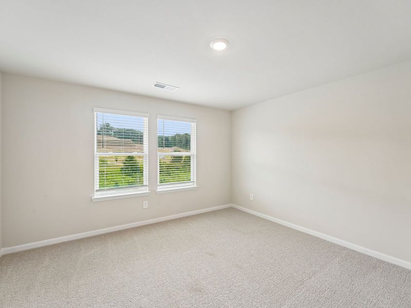 Spacious, unfurnished interior of a new home in Hemingway - Highland Series, Cumming (Image 19).