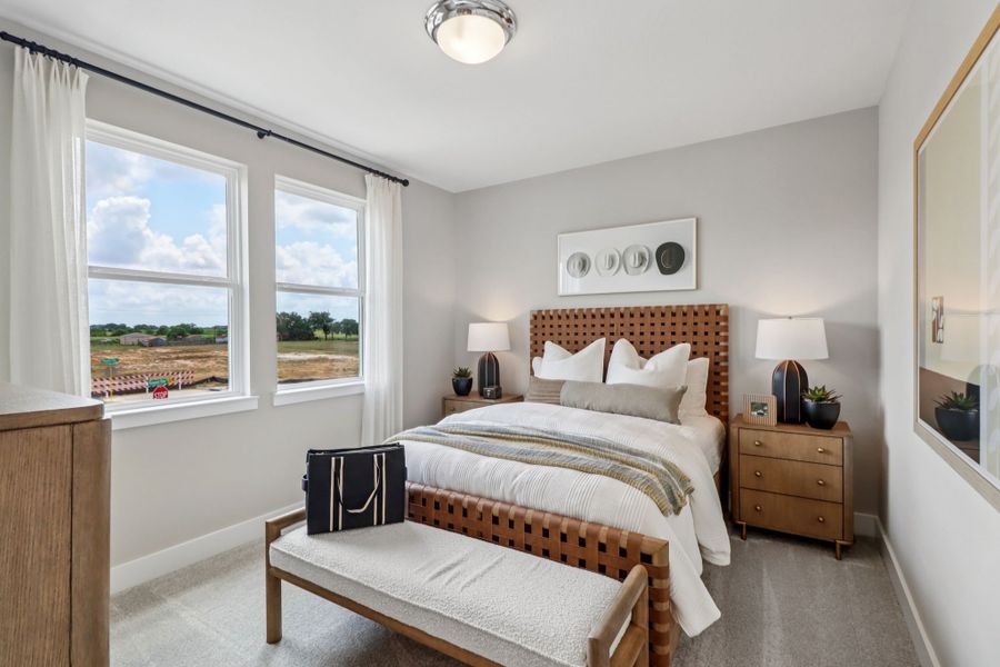 Furnished interior in a model home at The Residences Collection at Oakberry Trails in Waller (Image 19).