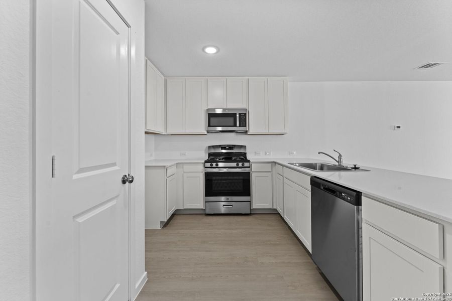 Furnished interior view inside a new home in , New Braunfels (Image 6).