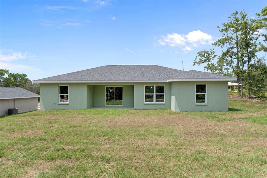 Front exterior of a new home in , Dunnellon, FL, highlighting curb appeal (Image 24).
