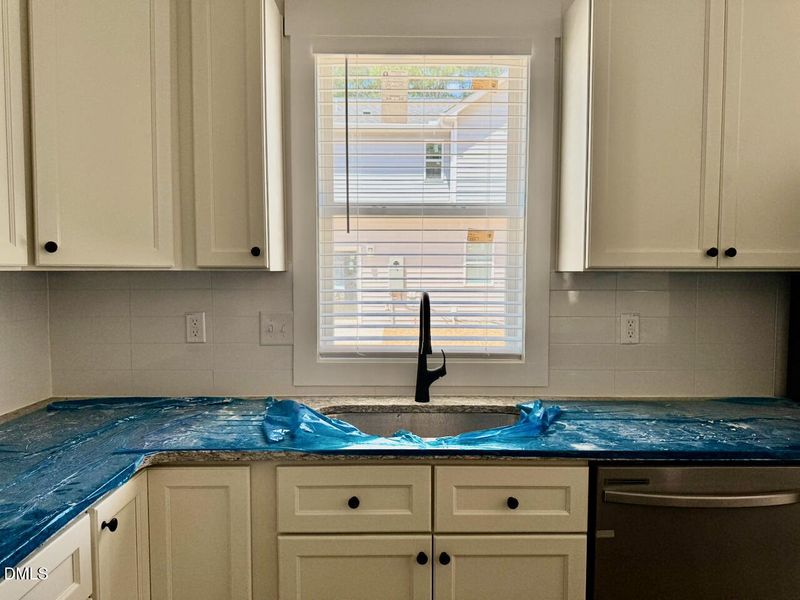 Kitchen Sink + Cabinet Detail Kitchen Sink + Cabinet Detail