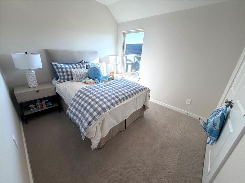This home features two bedrooms upstairs with a shared bath for convenience.