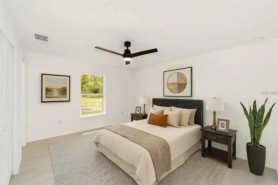 Furnished interior view inside a new home in , Dunnellon (Image 11).