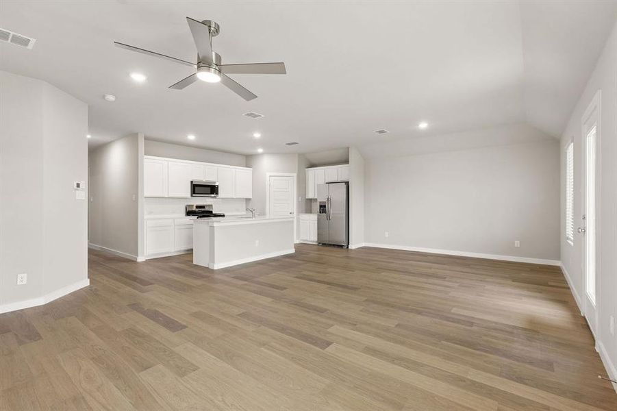 Open Floor Plan in the Emmy II home plan by Trophy Signature Homes - REPRESENTATIVE PHOTO