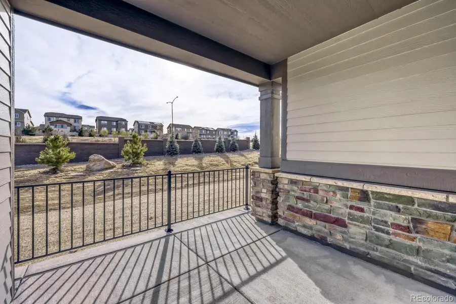 Exterior details and patio area of a home in Knolls, Westminster (Image 21).