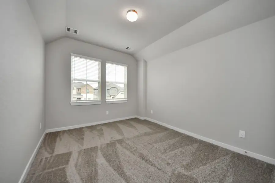 Discover another view of the secondary bedrooms. Sample photo of completed home with similar floor plan. Actual colors and selections may vary. Discover another view of the secondary bedrooms. Sample photo of completed home with similar floor plan. Actual colors and selections may vary.