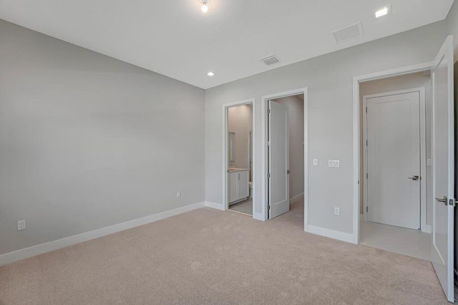 Front exterior of a new home in Apex at Avenir, Palm Beach Gardens, FL, highlighting curb appeal (Image 25). Front exterior of a new home in Apex at Avenir, Palm Beach Gardens, FL, highlighting curb appeal (Image 25).