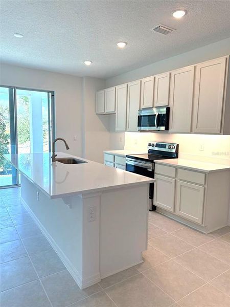 Furnished interior view inside a new home in Delaney Reserve, Deland (Image 15).