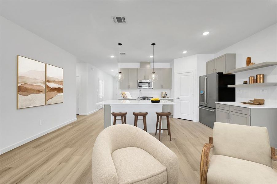 Furnished interior view inside a new home in Aspire at Reunion, Newark (Image 16).