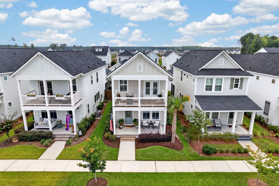 Front exterior of a new home in Nexton - Midtown - The Park Collection, Summerville, SC, highlighting curb appeal (Image 2). Front exterior of a new home in Nexton - Midtown - The Park Collection, Summerville, SC, highlighting curb appeal (Image 2).