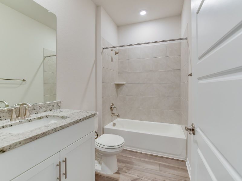 Furnished interior view inside a new home in Butler Farms - Boulevard Collection, Liberty Hill (Image 6).