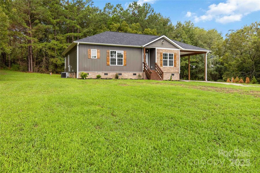 Front exterior of a new home in , Chester, SC, highlighting curb appeal (Image 2).