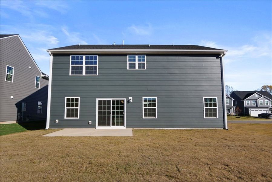 Exterior details and patio area of a home in Canterbrook Farms 2-Story, Fountain Inn (Image 16). Exterior details and patio area of a home in Canterbrook Farms 2-Story, Fountain Inn (Image 16).