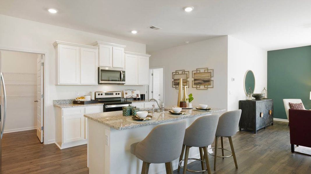 Representative furnished interior of a home built from the Robie by D.R. Horton in Kingston Ranch at Lake Oconee, Buckhead (Image 5).