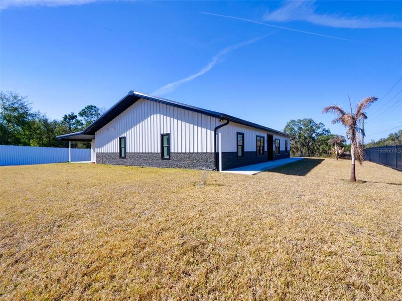 Exterior details and patio area of a home in , Webster (Image 29). Exterior details and patio area of a home in , Webster (Image 29).
