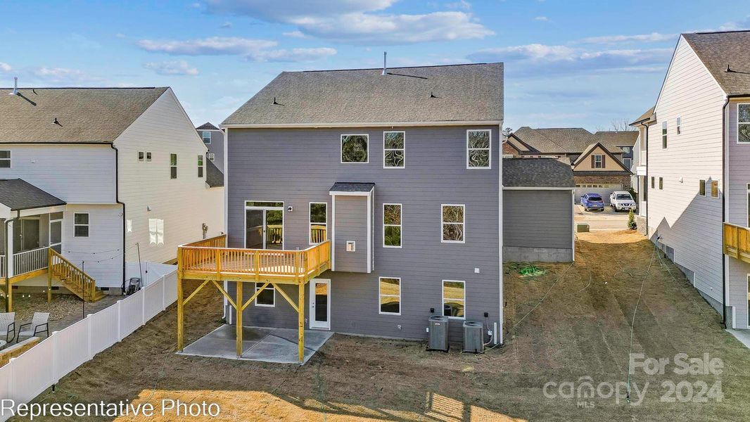 Rear Exterior of home with deck and walkout basement