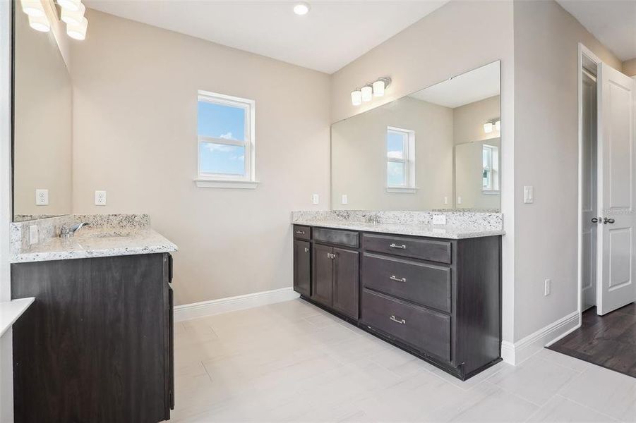 Furnished interior view inside a new home in Laureate Park, Orlando (Image 12).