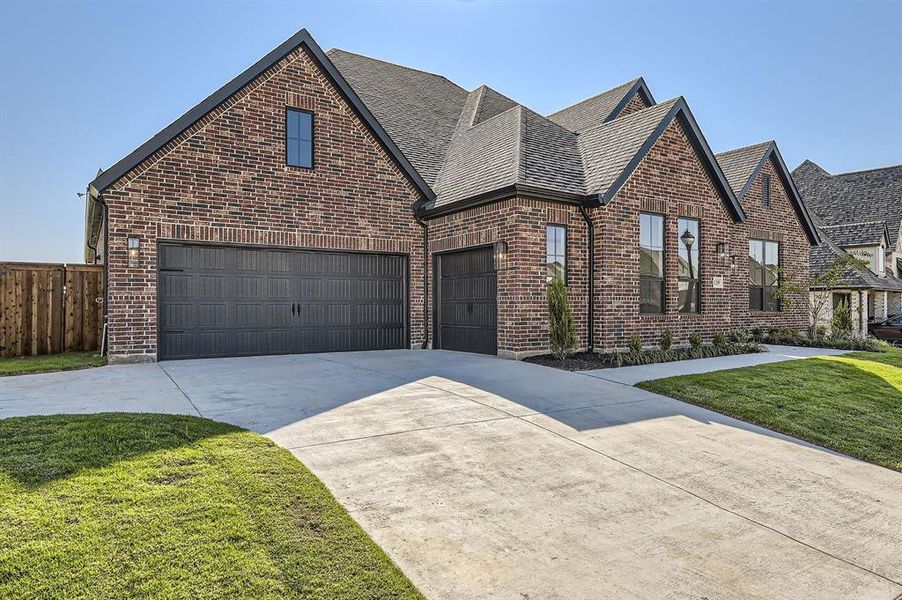 View of front of home with a front lawn