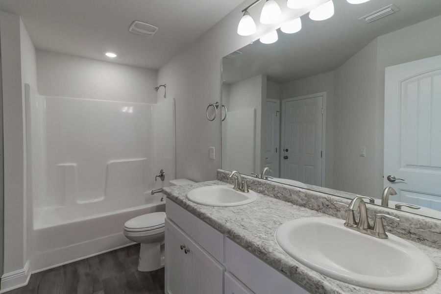 Furnished interior view inside a new home in Cedar Creek at Deerpoint Lake, Panama City (Image 6).