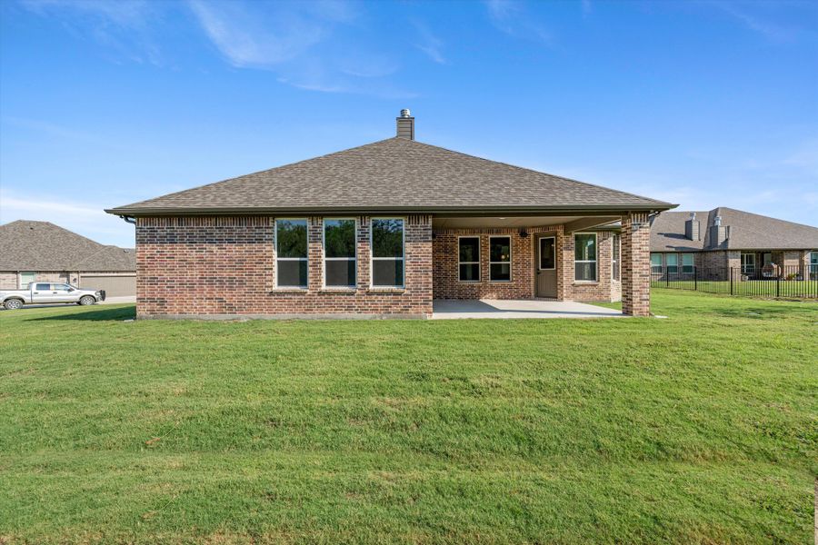 Exterior details and patio area of a home in Vista Oaks Estates, Royse City (Image 20). Exterior details and patio area of a home in Vista Oaks Estates, Royse City (Image 20).
