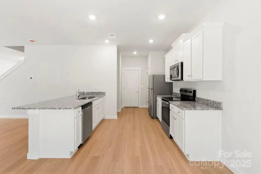 Furnished interior view inside a new home in Knights Bridge, Richburg (Image 4).