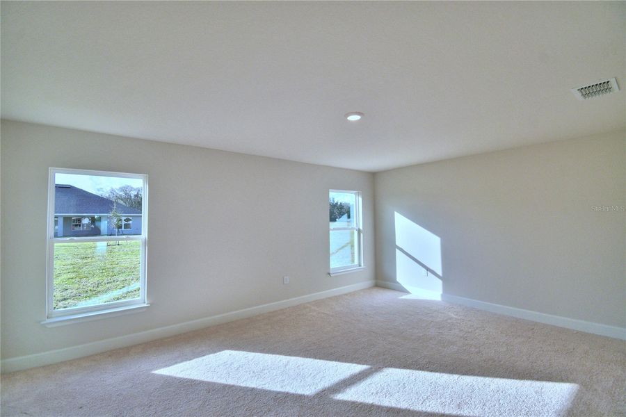 Spacious, unfurnished interior of a new home in Cadence Crossing, Auburndale (Image 22).
