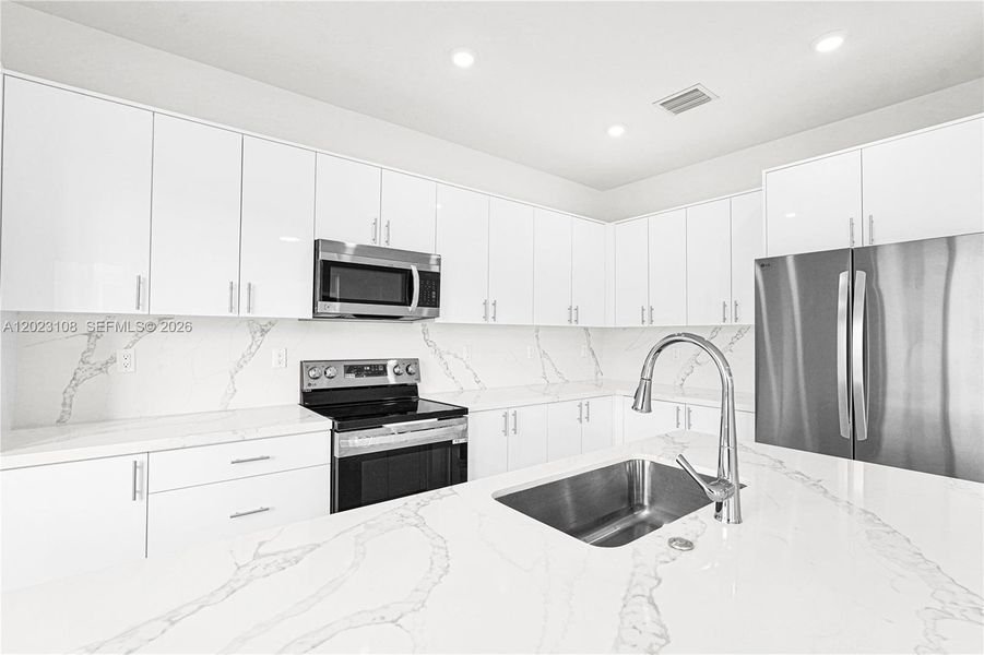 Furnished interior view inside a new home in Chloe's Estates, Miami (Image 9). Furnished interior view inside a new home in Chloe's Estates, Miami (Image 9).